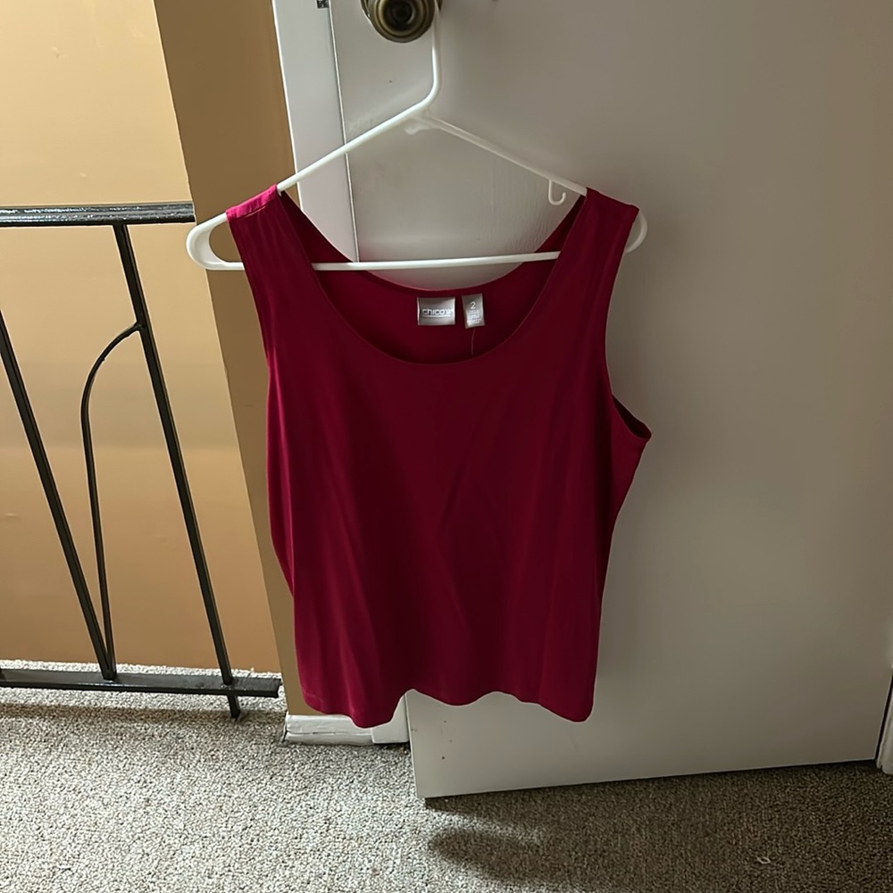 Chico size 2.  Look it up. Chico sizes differently never worn